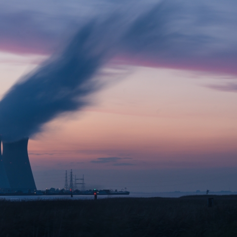 Skyline with power plant - Photo by Frédéric Paulussen on Unsplash