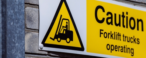 Forklift operation warning sign, mounted on exterior wall