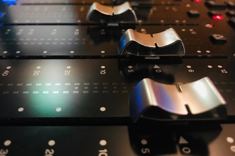 A close-up of sound faders