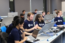 Students at computers in the University's space mission design facility
