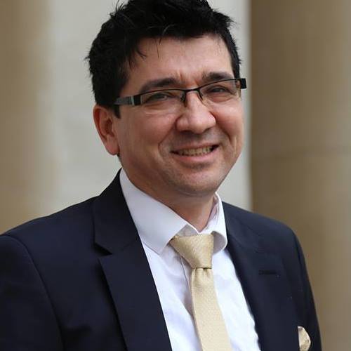 Headshot photo of Dr Ali Selcuk Can