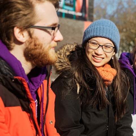 Three people laughing