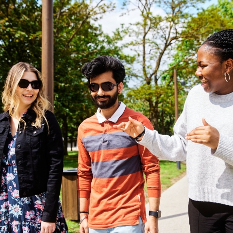 Three people walking