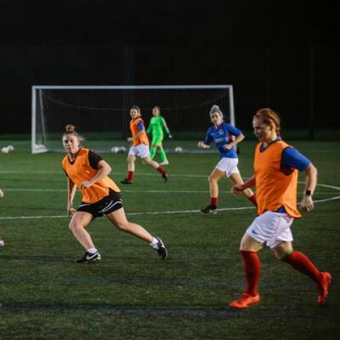 Group of women playing football