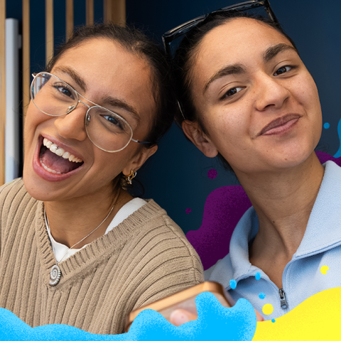 Two women smiling