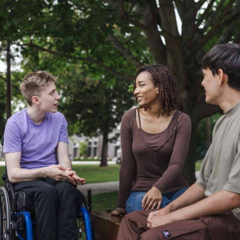 Three students talking
