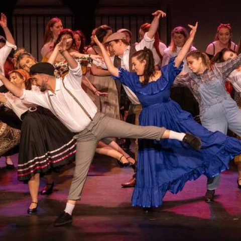 Students performing in musical theatre show