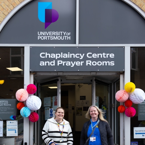 Two women stood outside of the Chaplaincy