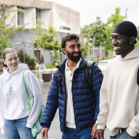 Students walking and laughing