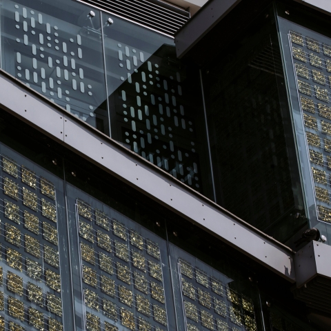 Two students looking at a computer screen 