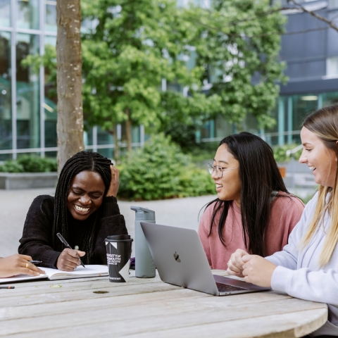 Four University of Portsmouth students talking