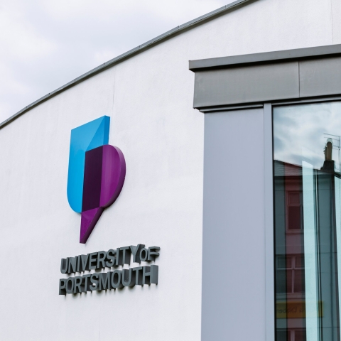 University of Portsmouth logo on building