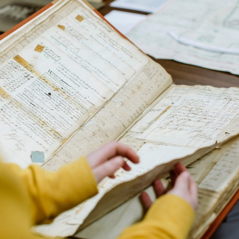 History student examines historical record. BA (Hons) History.