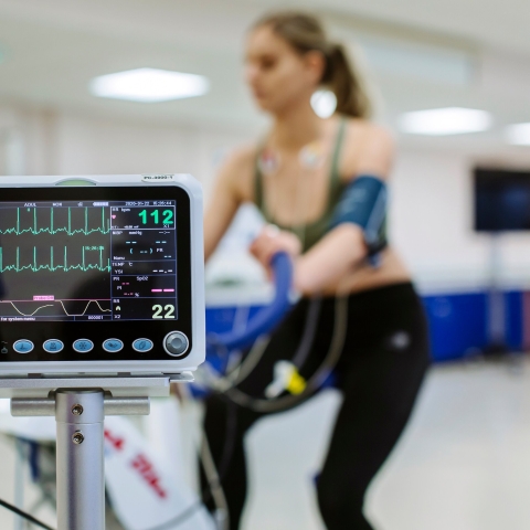  Heart rate monitor tracking a student on exercise bike