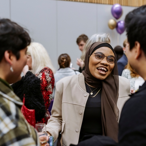 Three people talking