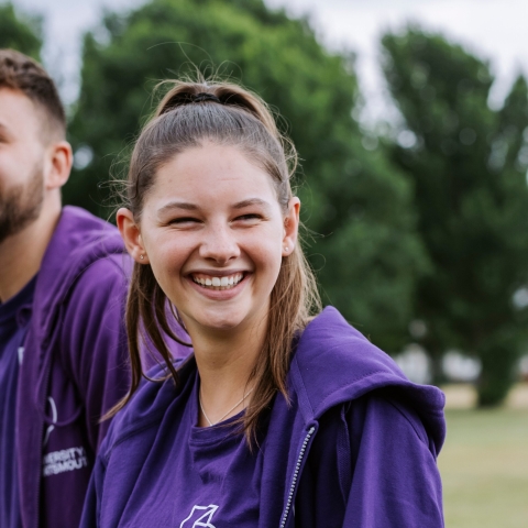 Female student ambassador stood outsideUp for Uni Day 1