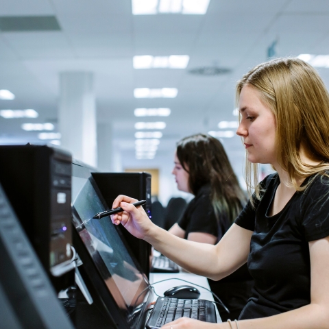 Student using WACOM drawing tool