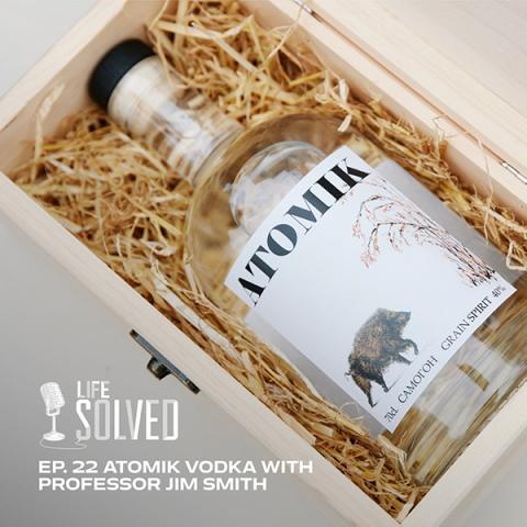 Bottle of Atomik Vodka in a box