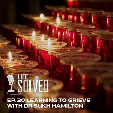 Red candles in rows. Life Solved title and logo.