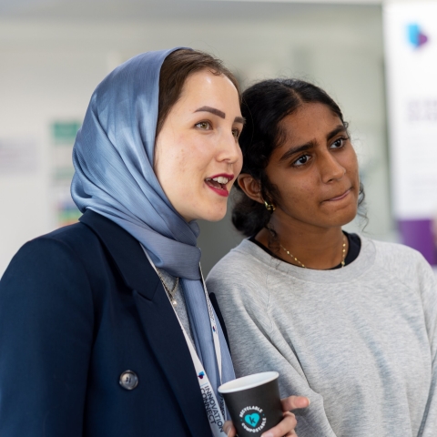 Two women stood together