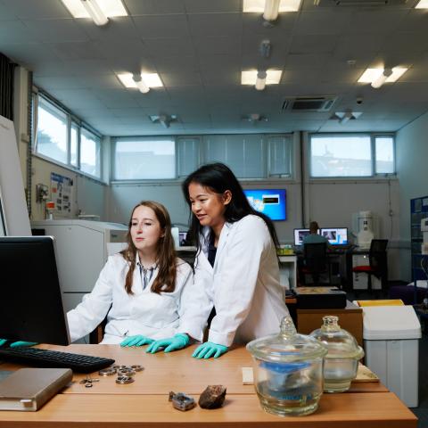 Two female University of Portsmouth scientists in the lab