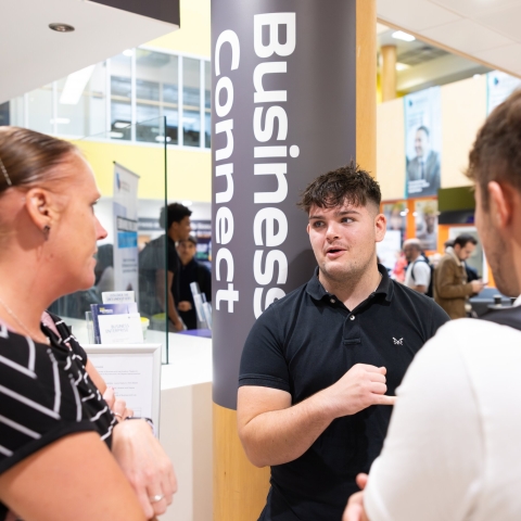 Three people talking