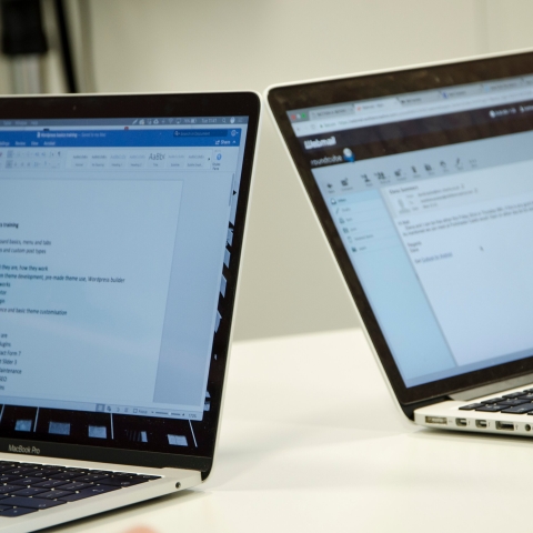 A close up of a couple of computers