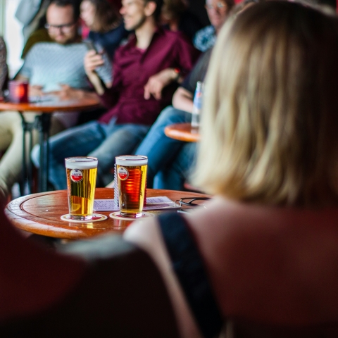 unsplash image people in pub with pints