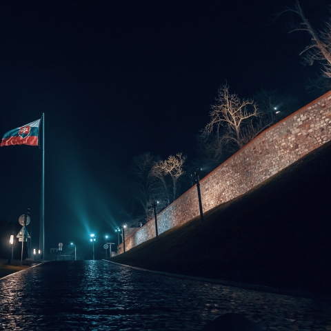 Slovakian flag on a road in the dark - Photo by Michael Pointner on Unsplash