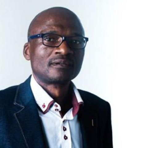Headshot of Dr Ottis Mbaiwa