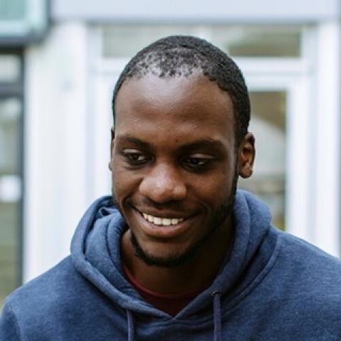 Male BAME University of Portsmouth student smiling