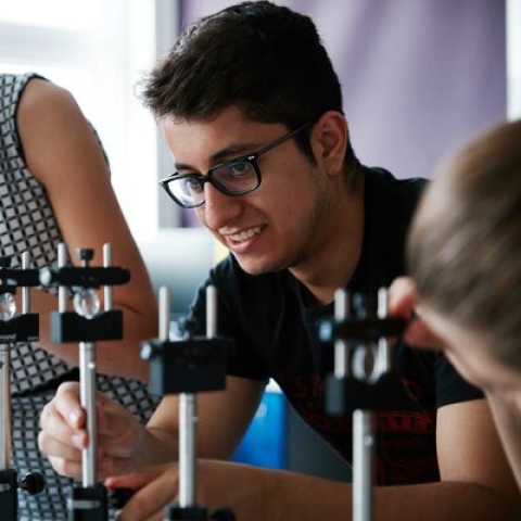 Students setting up lenses in Quantum Optics Laboratory