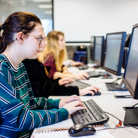 Female University of Portsmouth student working in computer lab