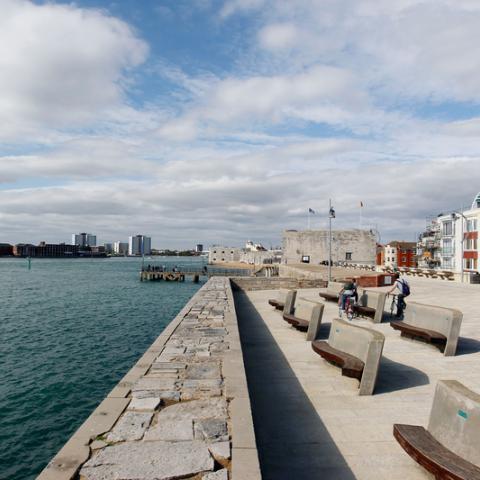 Sea view of Old Portsmouth, with outside stone benches