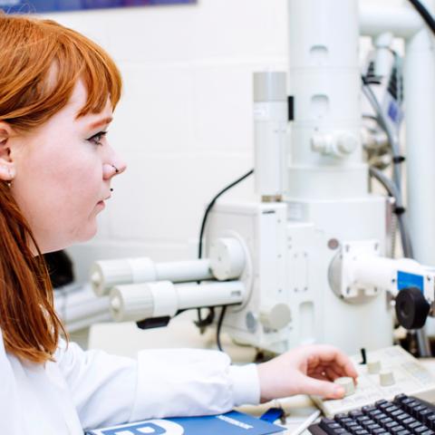 Female student  on computer in biology lab