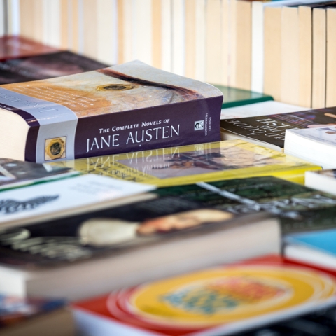 Close-up of paperback books on a table