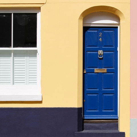 Colourful house with blue front door