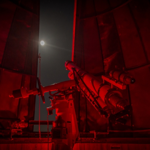 A telescope looking out into the night sky