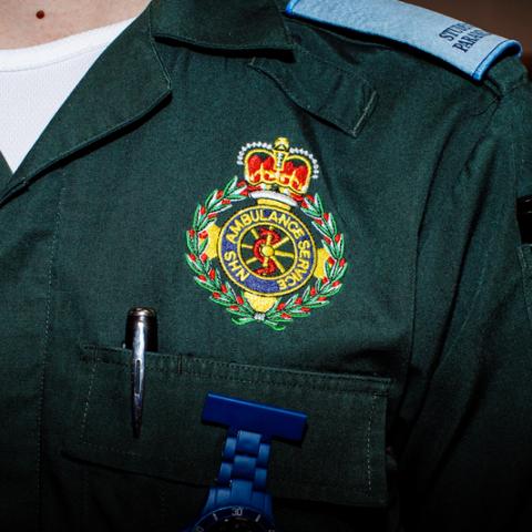 Ambulance paramedic uniform, close-up of badge