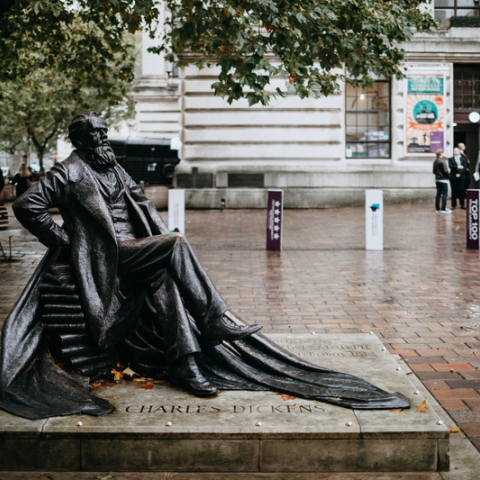 Status of Charles Dickens in Guildhall square