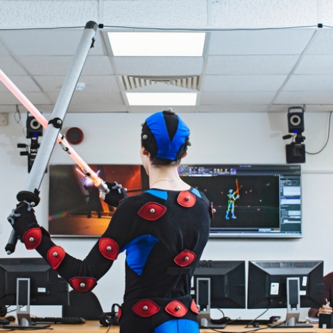 Student in motion capture suit in the studio