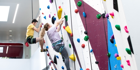 Photo of visitors using the climbing wall - Ravelin Activities