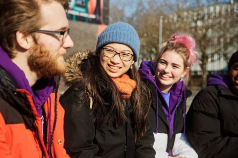 Three people laughing