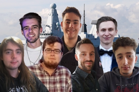 Seven male students from the Faculty of Creative and Cultural Industries with a Aircraft Carrier in the background