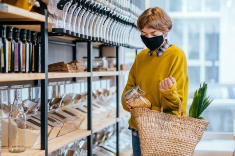 Woman shopping in a zero waste store
