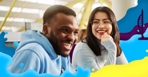 Two students smiling