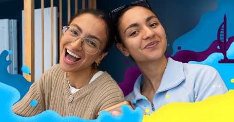 Two women smiling