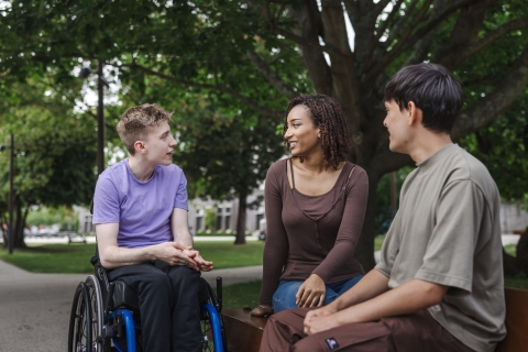Three students talking