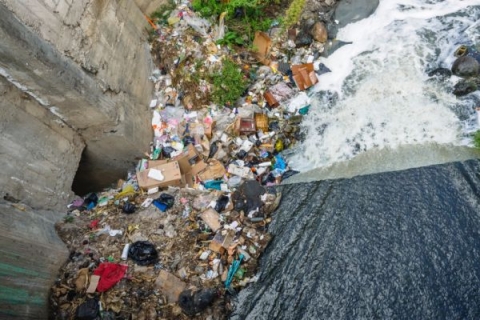 Image of landfill next to a body of water
