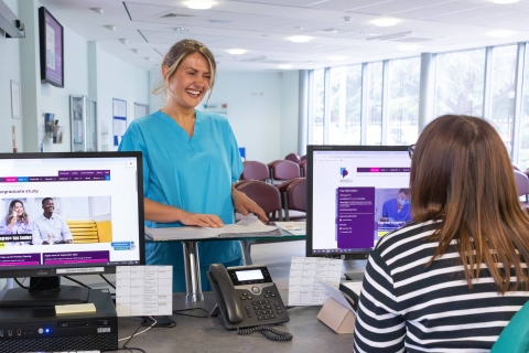 A student nurse at reception
